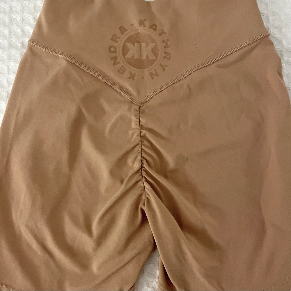 KK Fit Gymshark Scrunch Bum shorts. Color warm nude. Never wore. Size XS